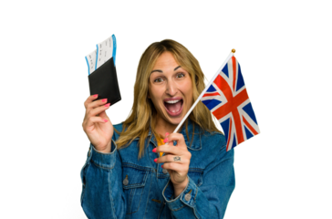Young caucasian woman holding a passport and England flag isolated on green chroma background