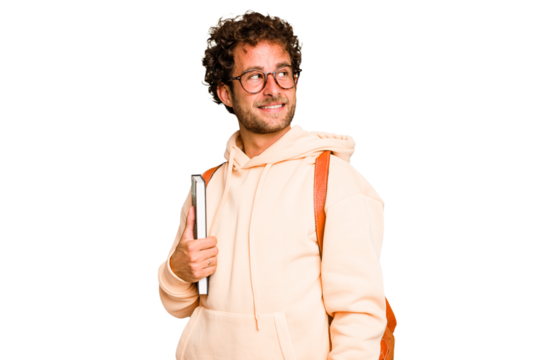 Young caucasian student man isolated looks aside smiling, cheerful and pleasant.