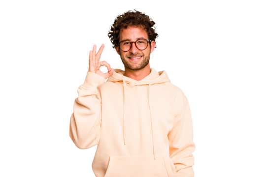Young caucasian curly hair man isolated Young caucasian man with curly hair isolated cheerful and confident showing ok gesture.