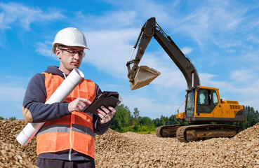 Preparation for construction. Man with tablet. Excavator driver away from machine. Man excavator...