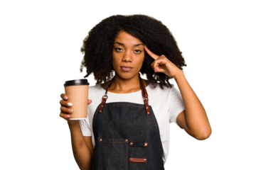Young african american woman barista holding a takeaway coffee pointing temple with finger, thinking, focused on a task.