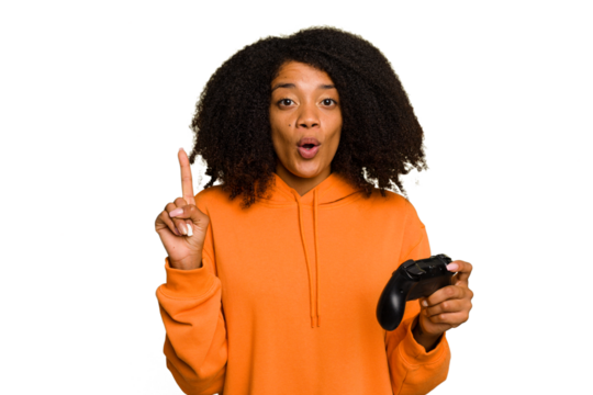 Young African American woman holding a game controller isolated having some great idea, concept of creativity.