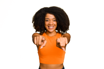 Young African American woman isolated cheerful smiles pointing to front.