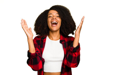 Young African American woman isolated laughs out loudly keeping hand on chest.