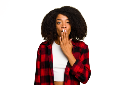 Young African American woman isolated shocked, covering mouth with hands, anxious to discover something new.