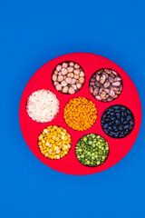 A PLATE OF DIFFERENT KIND OF BEANS 