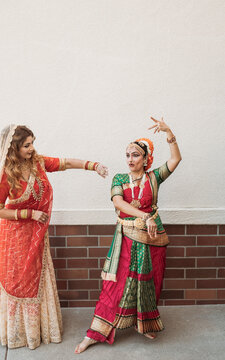 Two Indian dancers talking and sharing stories 