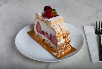 Strawberry Fruit Cake Slice on a White Plate