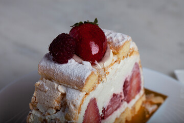 Strawberry Fruit Cake Slice on a White Plate
