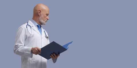 Doctor checking patient's medical records
