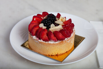 Strawberry Fruit Tartlet on a White Plate