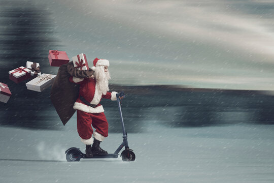 Santa Claus riding a scooter and delivering gifts