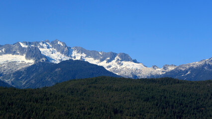 Fototapeta premium Glacier and mountains, peaks, sky, Canada.