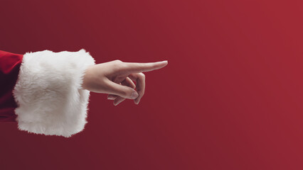 Santa Claus pointing finger forward