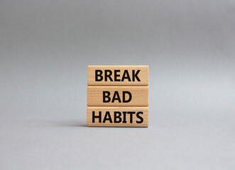 Break bad habits symbol. Concept words Break bad habits on wooden blocks. Beautiful grey...