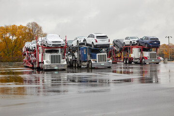 Car carrier trucks transporting vehicles from northern climates to the American sunbelt for the...