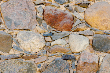 Stone wall texture background natural color. Close-up