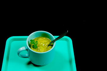 Delicious guacamole on top of a black background