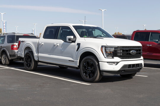 Used Ford F150 display at a dealership. With supply issues, Ford is relying on pre-owned car sales to meet demand.