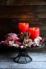 Christmas decoration with red burning advent candle, apple and cookies - second advent - xmas...