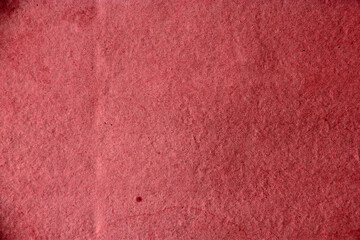 Fototapeta premium Old red vintage paper background or texture