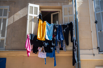 drying clothes on an old window