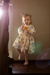 Girl with ponytails with lipstick