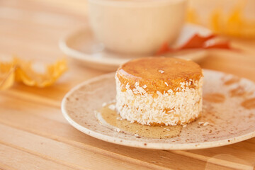 Aesthetic vegetarian autumn carrot dessert with agave syrup. No baking and no sugar gluten free cake