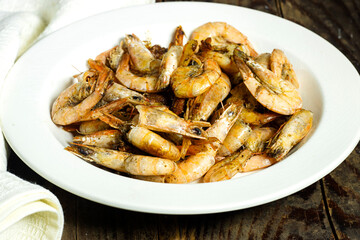 Delicious roasted grilled shrimps on plate