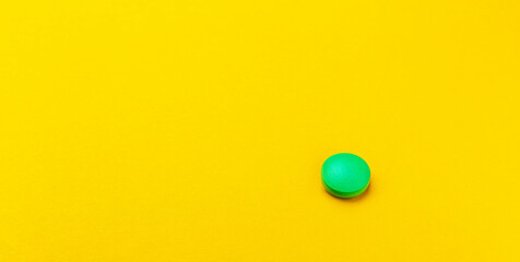medical pills close-up on a yellow background