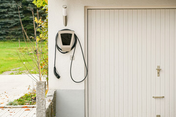 Charging station for an electric car in the garage of a private house.