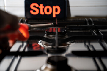 Stop Domestic gas problem. Energy crisis in Europe due to inflation and war. Increase the price of natural gas. Natural gas burning. No natural gas supplies. Gas cooler with burning flames. 