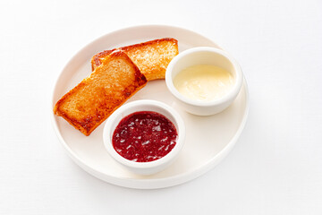 toasts with jam and sweet sauce