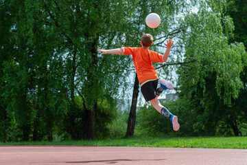 School kid playing volleyball in a physical education lesson. Horizontal education poster, greeting...