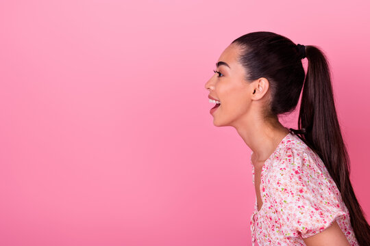 Profile photo of astonished positive person open mouth look empty space isolated on pink color background
