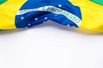 Brazilian flag on white background with copy space