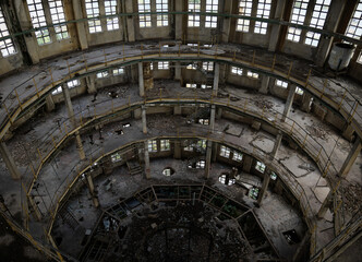 Abandoned multi-storey circular building interior top view
