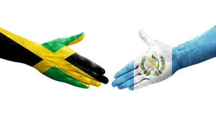 Handshake between Guatemala and Jamaica flags painted on hands, isolated transparent image.