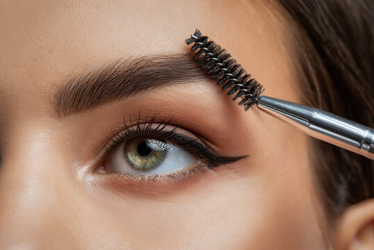 Long-lasting styling of the eyebrows and color the eyebrows. Eyebrow lamination. Professional make-up and face care.