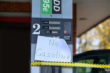 Petrol pumps have sign No Gasoline due to fuel shortage crisis.