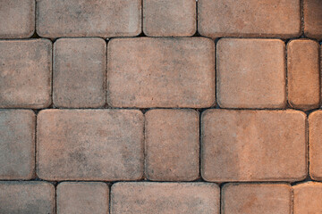 Obraz premium City road tiles with pebble top view close up texture.