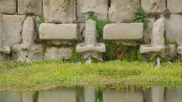 Eflatun Pinar ( Eflatunpinar) Ancient Hittite relief sculpture monument and sacred pool, and its Hittite relief scultures of Hittite gods
