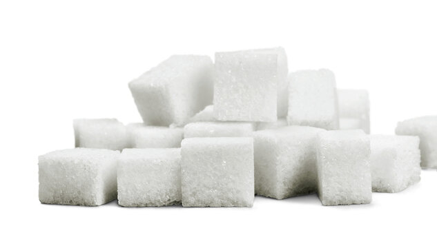 Cubes of sugar on white background