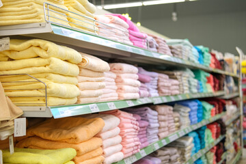 Store shelves with towels. Shop with a wide range of towels.