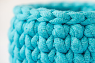 crocheted  blue basket, stuff organizer, crochet baskets bottom, pattern for crocheting, nature-friendly sustainable handicraft business, cute interior items. Space for your text