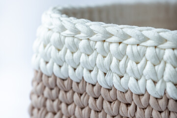 crocheted cute beige and white basket, stuff organizer, crochet baskets bottom, pattern for crocheting, nature-friendly sustainable handicraft business, cute interior items. Space for your text