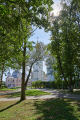 Fototapeta na wymiar Russia. City of Vologda. View of the Kremlin from the alleys of the coastal park