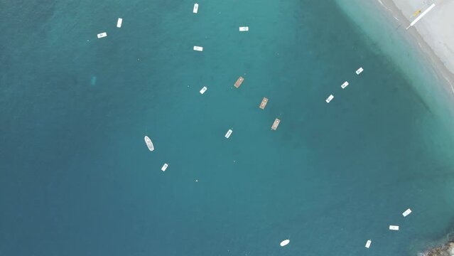 Aerial view of boats along the shoreline in Erchie, Amalfi Coast, Salerno, Campania, Italy.
