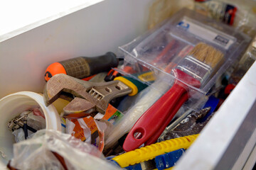 set of tools for construction A drawer With a variety of renovation work tools Hammer nail drill pliers...