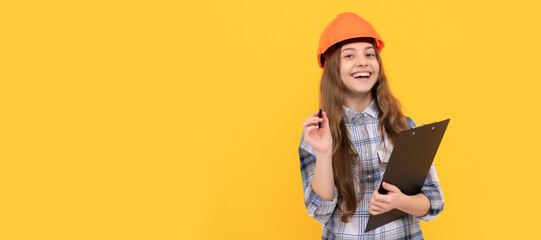 building and construction. happy child worker wear hardhat hold clipboard. childhood development. Child in hard hat horizontal poster design. Banner header, copy space.